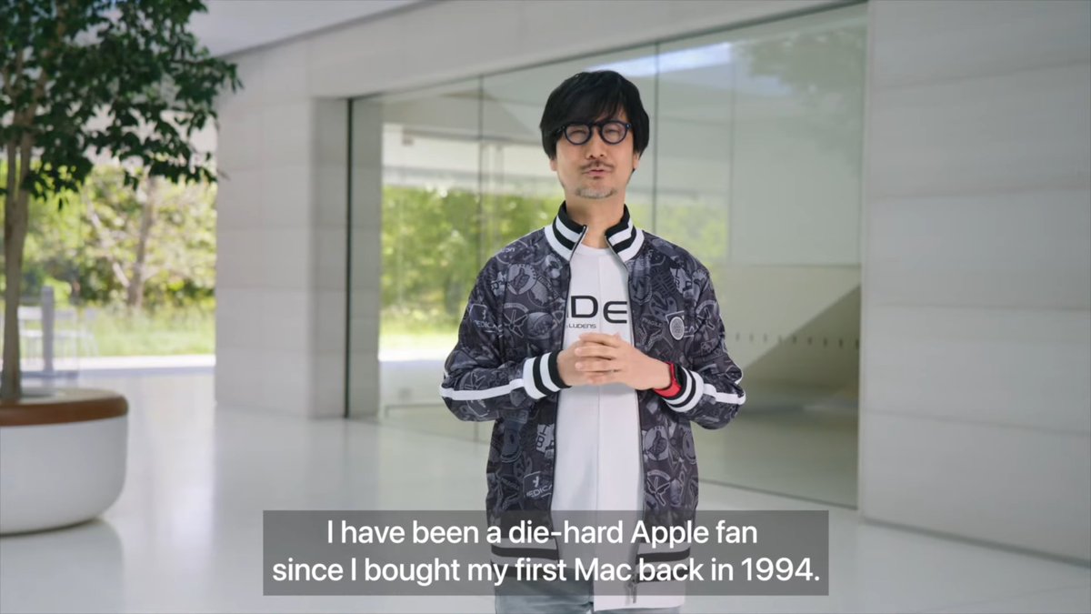 A photo of Hideo Kojima from the WWDC 2023 presentation. It is subtitled with the text 'I have been a die-hard Apple fan since I bought my first Mac back in 1994.'
